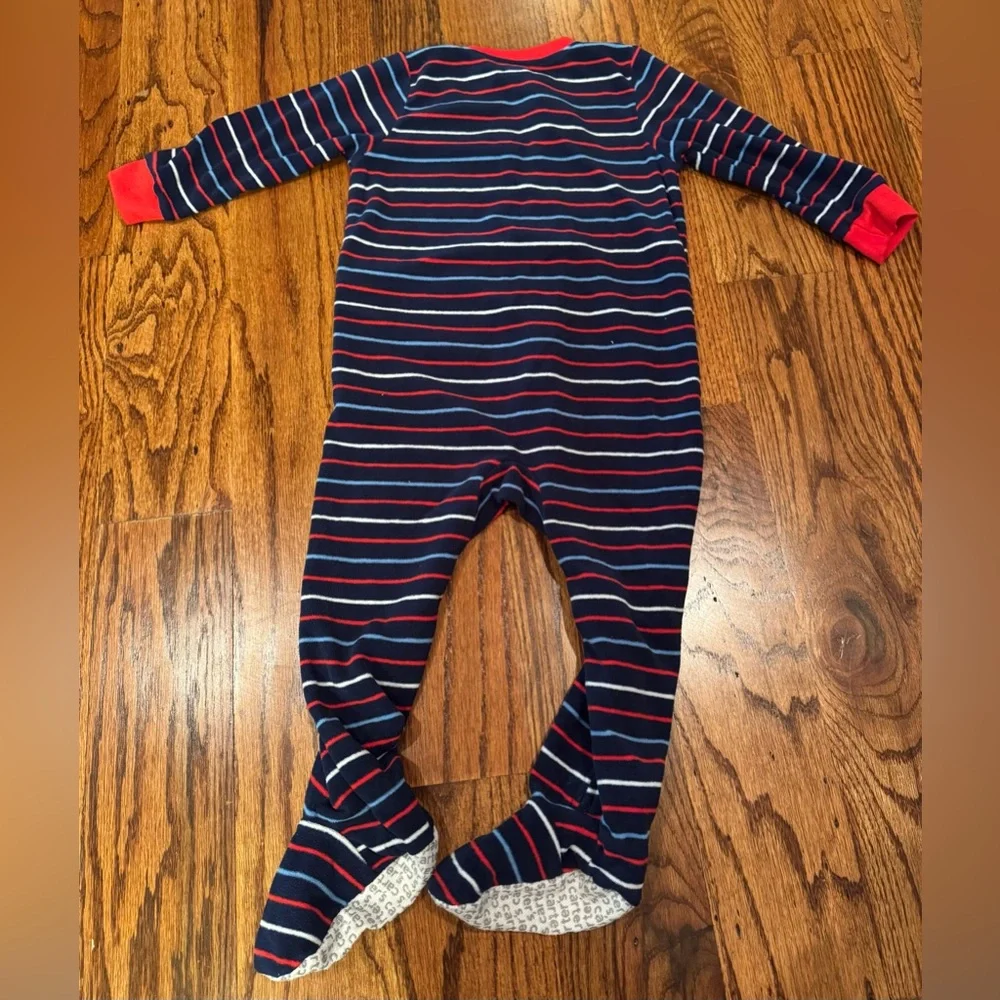 Pair of Carter's fleece PJs with zipper and footies.  Size 24 Months